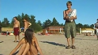 Young And Innocent-Looking Teen Indulges In Nude Beach Play